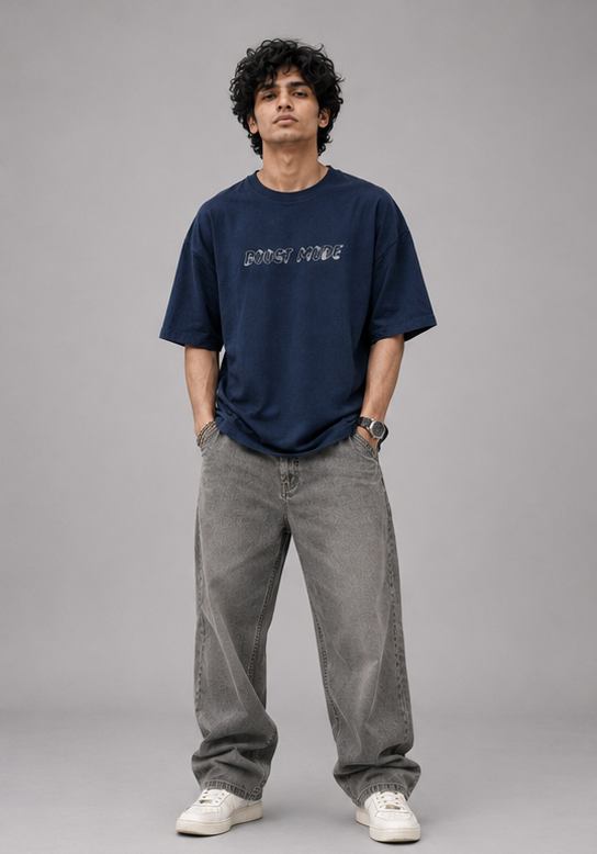 Male model wearing Oversoul Boost Mode oversized t-shirt in deep navy blue full body front view