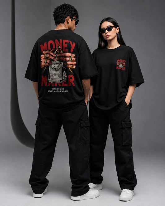 Male and female models wearing Oversoul Money Maker Graphic Unisex Oversized T-Shirt in black showing front and back design