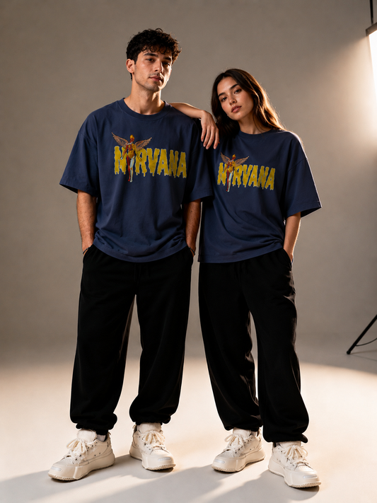 Male and female models wearing Oversoul Nirvana Graphic Unisex Oversized T-Shirt in deep navy blue front view